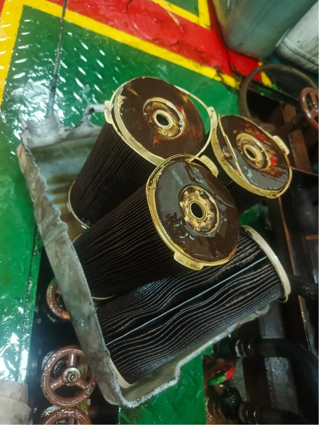 Fuel filters with heavy sludge after 6 days before additive use