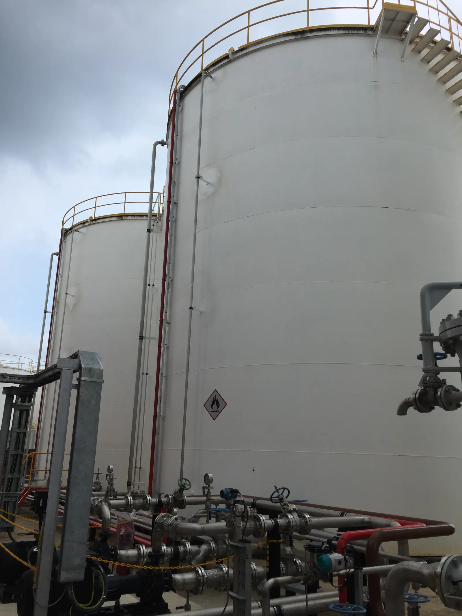 Bulk chemical storage tanks and piping at a toll blending facility